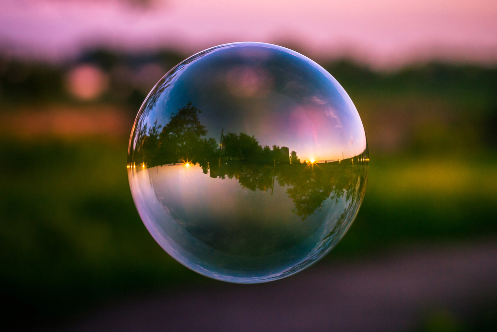 Picturesque view in a soap bubble